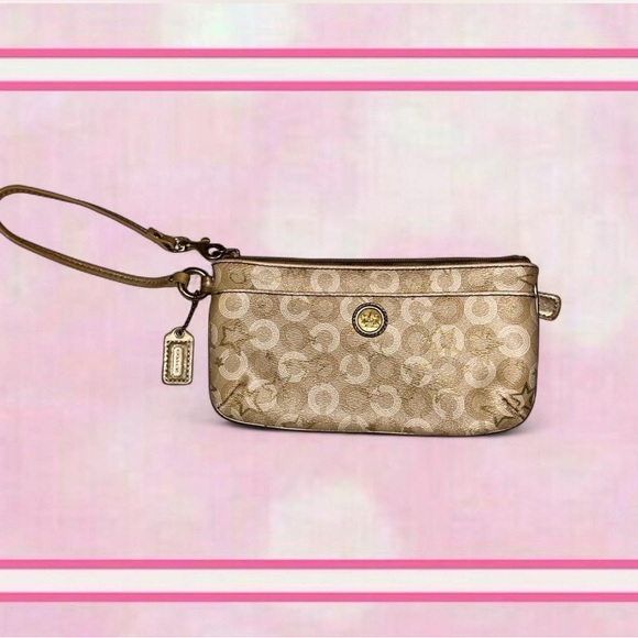 Coach Handbags - Coach Gold Wristlet Clutch